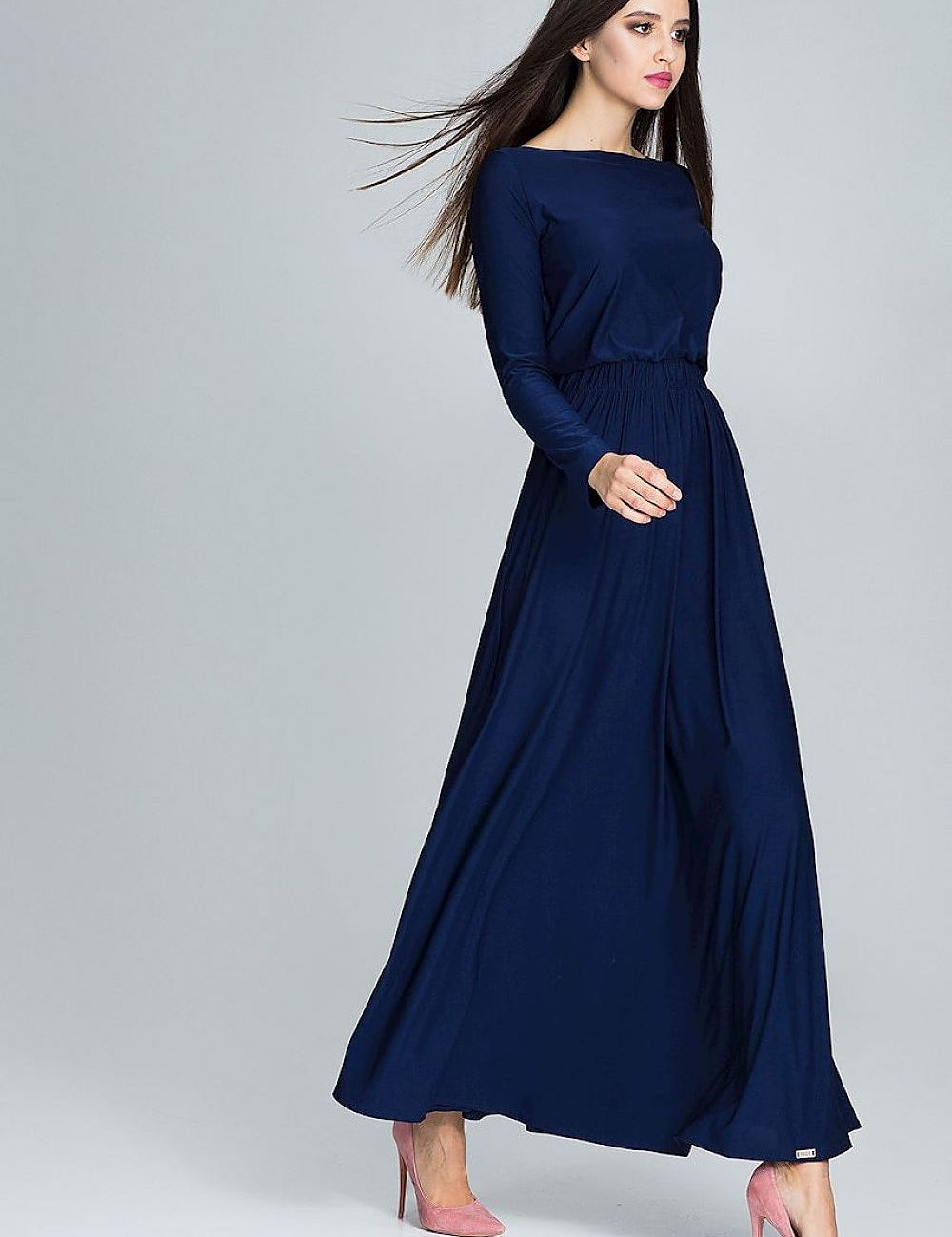 Woman wearing Noraya Soft Drape Maxi Dress in navy, highlighting its relaxed silhouette and elegant flow in a semi-formal setting.
