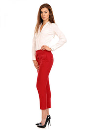 Woman wearing Plus Size Marvielle High-Waist 7/8 Trousers in red, showcasing tailored fit and elegant style.