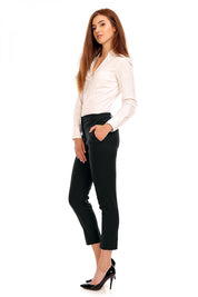 Model wearing Plus Size Marvielle High-Waist 7/8 Trousers with white blouse and heels, showcasing elegant and chic style.