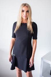 Plus Size Selvianne Frill Hem Dress with elbow-length sleeves and fitted top, showcasing chic style for formal or daytime wear.