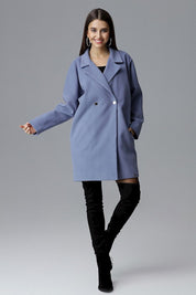 Model wearing Calverra Loose-Fit Coat with Kimono Sleeves, double-breasted design, modern blue color, stylish and versatile.