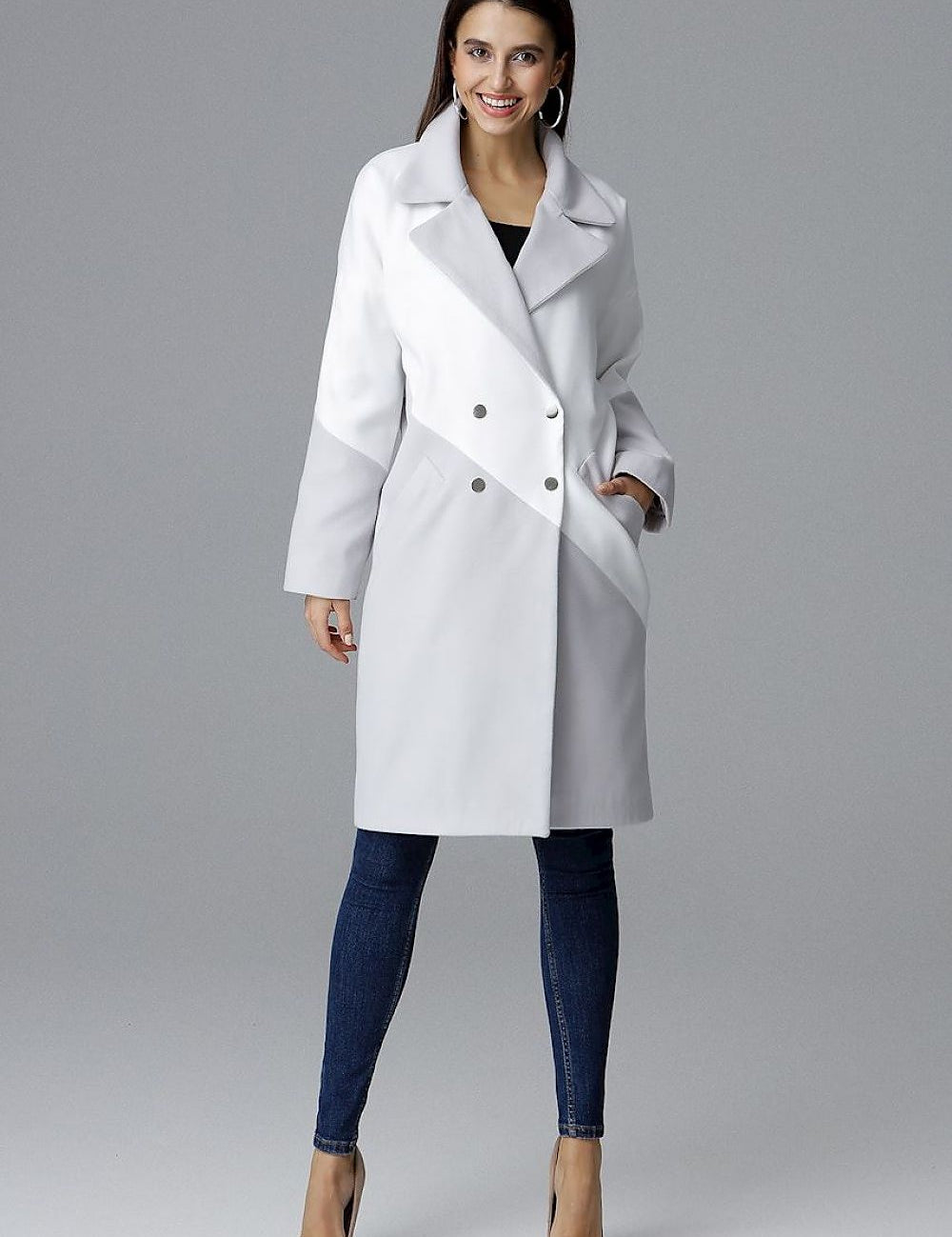 Woman wearing Ornavine two-tone coat with turn-up collar and silver snap fasteners, showcasing elegant and stylish outerwear for everyday wear.