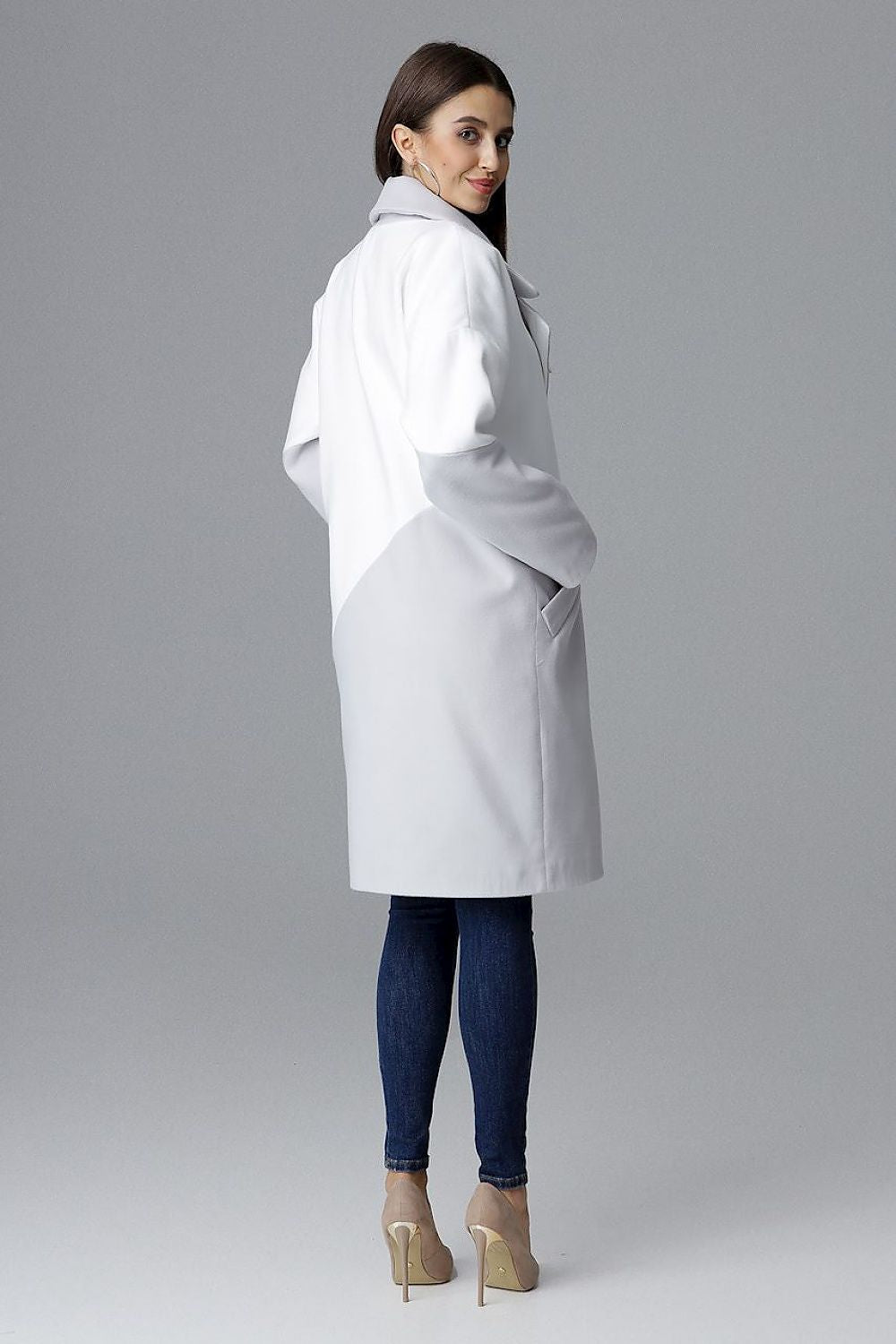 Woman wearing Ornavine two-tone coat with turn-up collar, showcasing style and comfort.