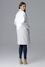 Woman wearing Ornavine two-tone coat with turn-up collar, showcasing style and comfort.