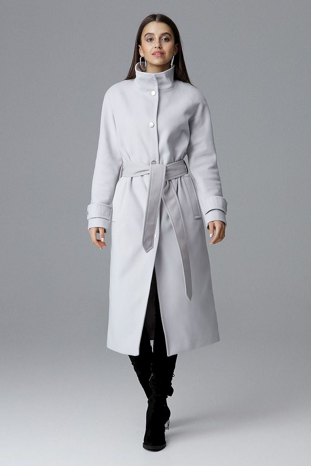 Woman wearing Melvarine Long Single-Breasted Belted Coat with button closure and waist belt, showcasing elegant, timeless design.