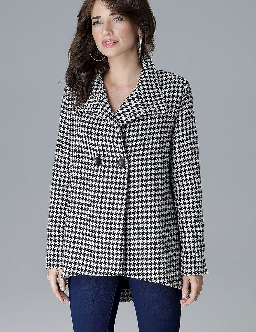 Woman wearing Arvennise Stand-Collar Jacket with modern zipper details and two-button closure, showcasing a chic contemporary style.