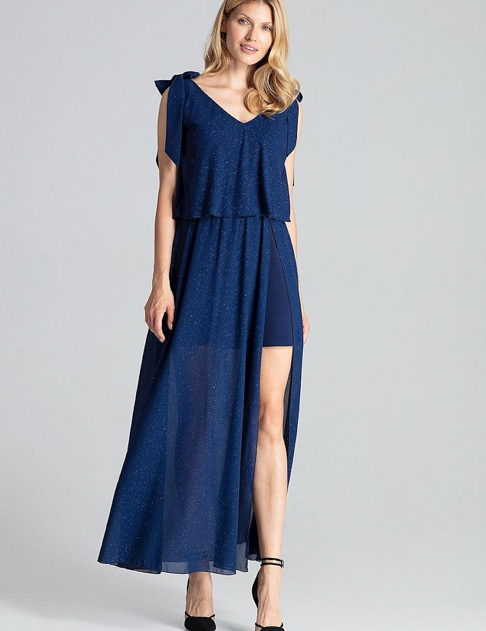 Sienna Navy Shoulder-Tie Cocktail Dress with high slit, deep neckline, and flared hem; showcases elegant draped design.