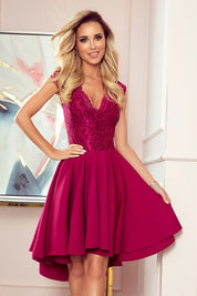 Elegant model wearing Miravelle Burgundy Lace High-Low Dress, showcasing romantic lace bodice and flowy asymmetrical skirt.