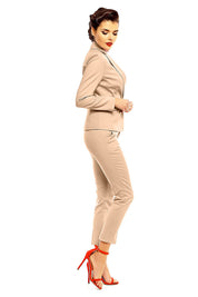 Plus Size Marvielle High-Waist 7/8 Trousers in beige, elegant tailored fit with high-rise waist, styled with red heels for office or casual wear.