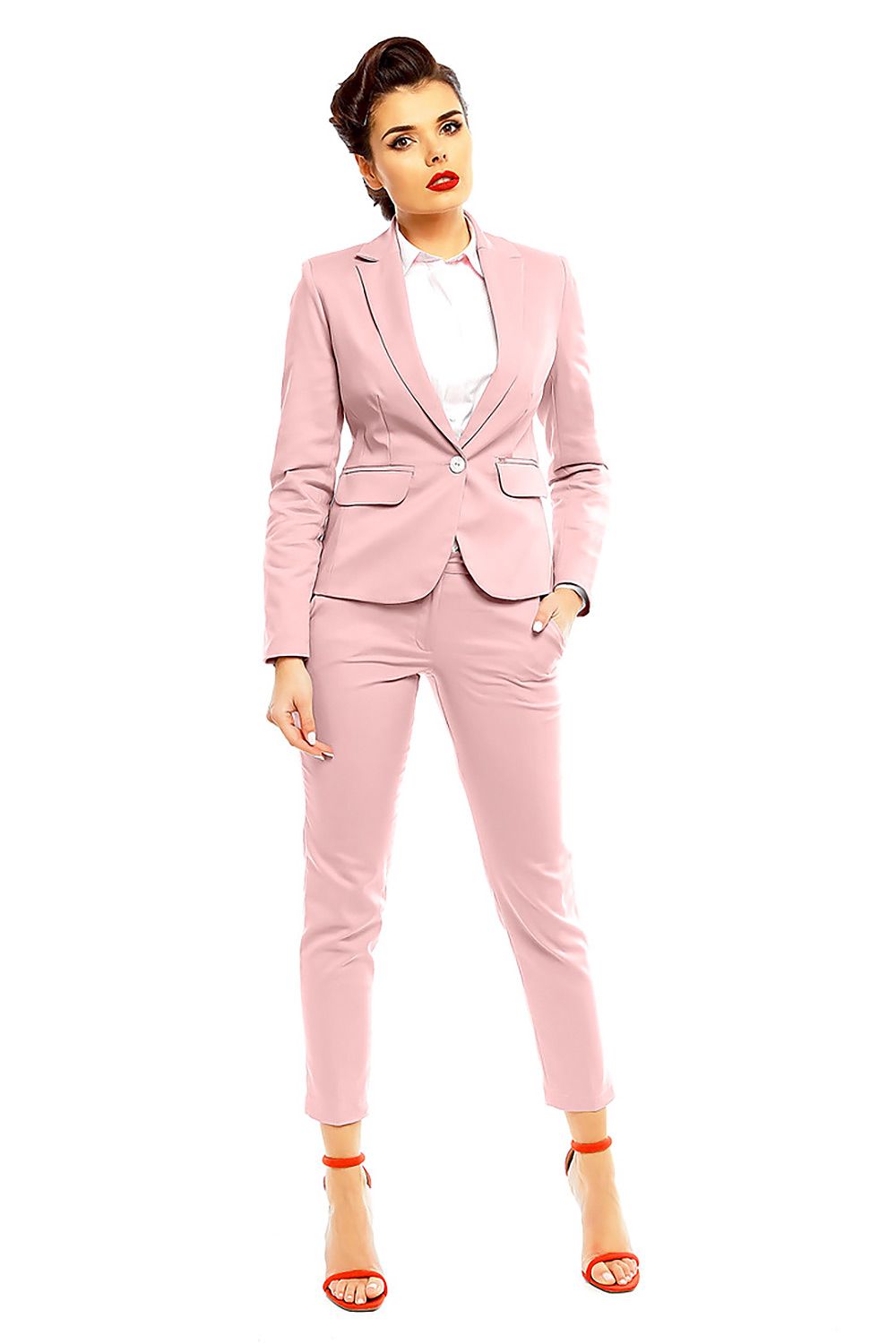 Model wearing pink Plus Size Marvielle High-Waist 7/8 Trousers with matching blazer and orange heels, showcasing elegant chic style.