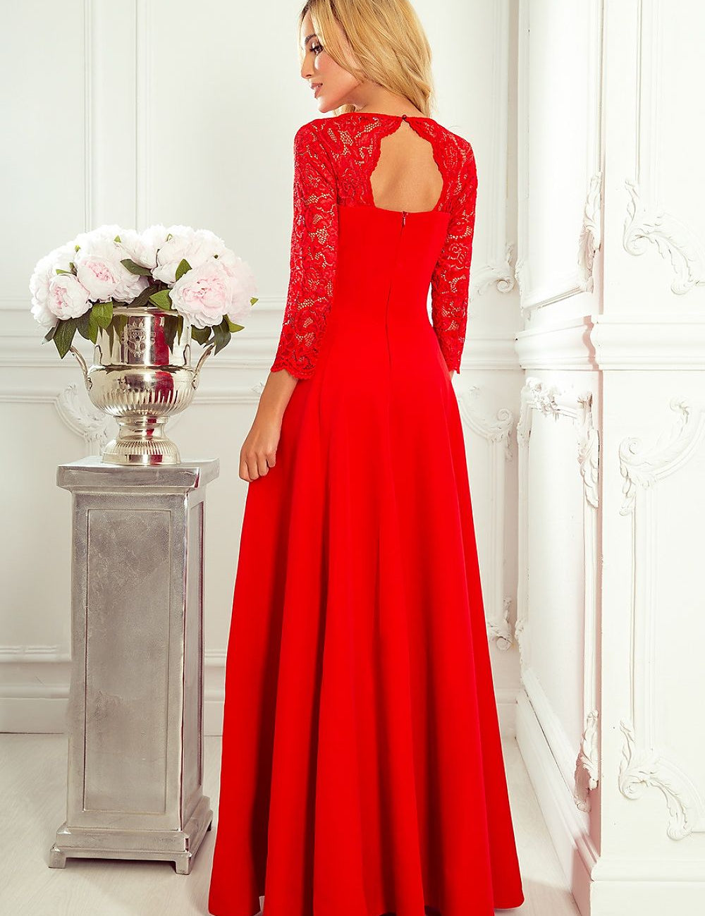 Elegant red lace gown with sweetheart neckline and thigh-high slit, perfect for formal events and special celebrations.