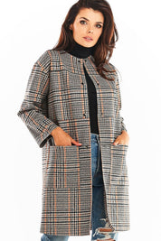 Woman wearing Calverisse Checked Straight-Cut Coat in navy blue and brown, featuring a modern collarless design with practical pockets.