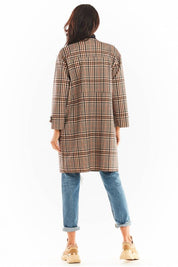 Back view of a model wearing a Calverisse Checked Straight-Cut Coat, featuring a timeless check pattern and long sleeves, in casual style.