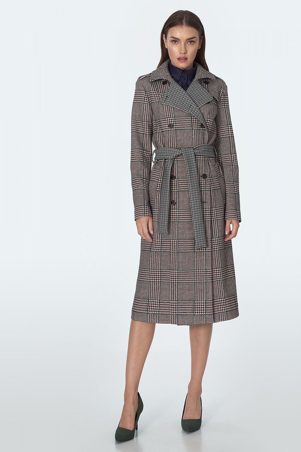 Model wearing Eryndale waist-defining checked coat, elegant tailored design, ideal for autumn and winter, versatile styling options.