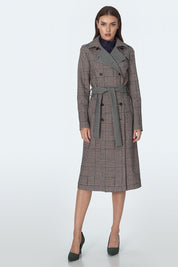 Model wearing Eryndale waist-defining checked coat, elegant tailored design, ideal for autumn and winter, versatile styling options.