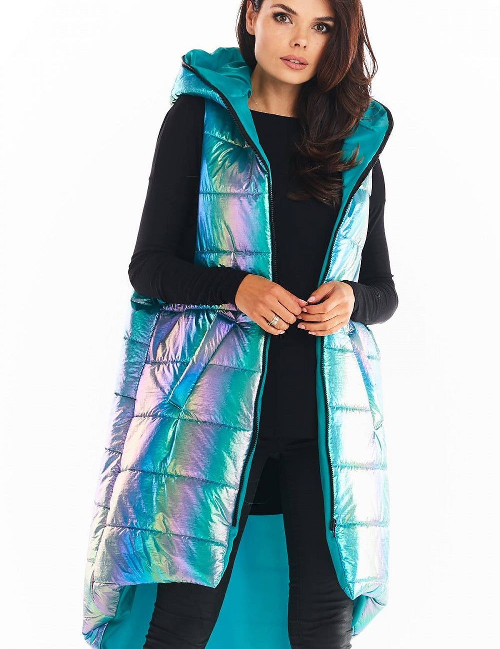 Woman wearing Lumarelle Holographic Hooded Gilet Vest in blue, showcasing extended back and large hood, perfect for autumn style.