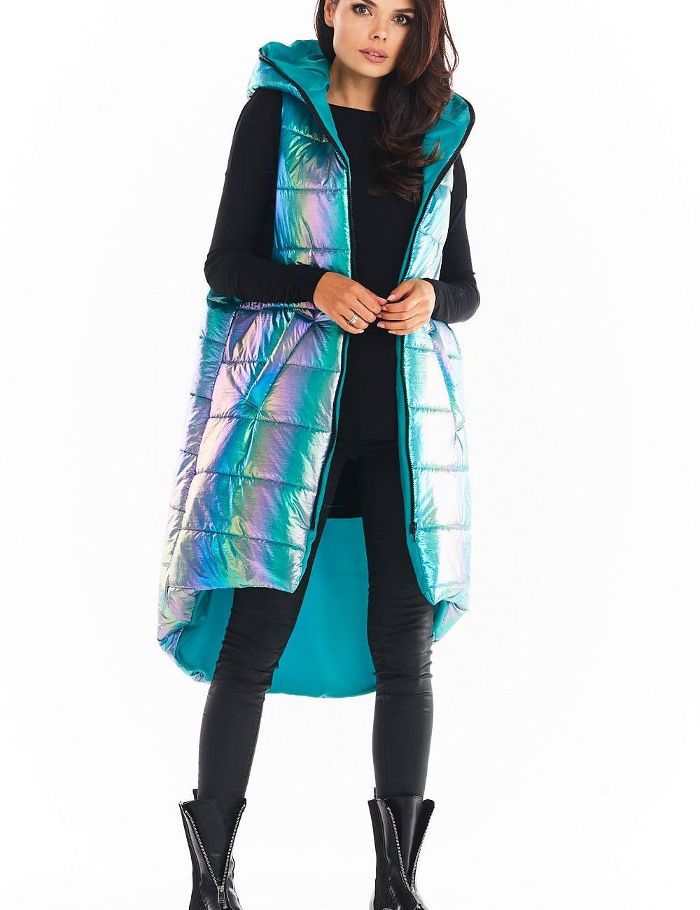 Woman wearing Lumarelle holographic hooded gilet vest with shimmering finish, large hood, and dynamic silhouette in mint color.