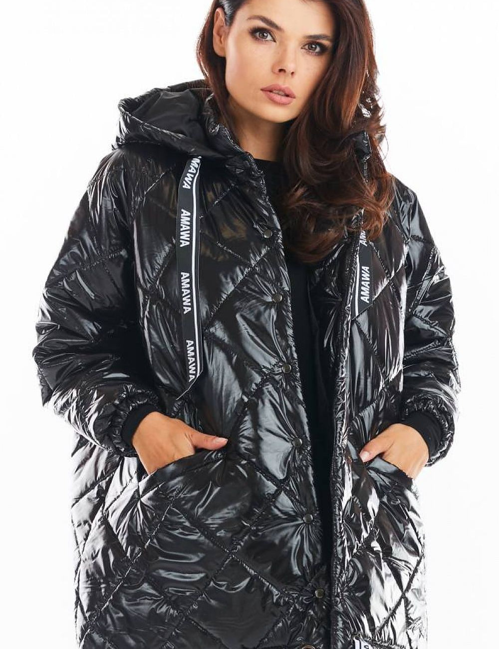 Amawa Oversized Quilted Hooded Jacket with snap fastening and logo tape, showcasing modern style and comfort.