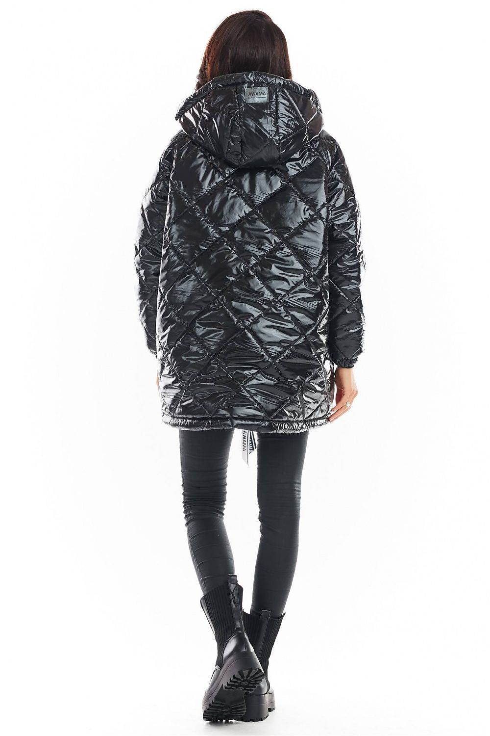 Back view of Amawa oversized quilted hooded jacket in black, featuring large hood and quilted design, showcasing modern casual style.
