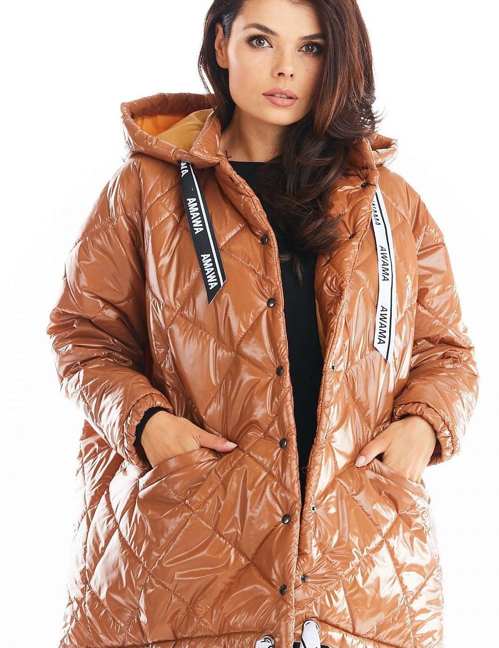 Amawa oversized quilted hooded jacket with front pockets and logo tape, featuring a large hood and snap fastening, perfect for casual comfort.