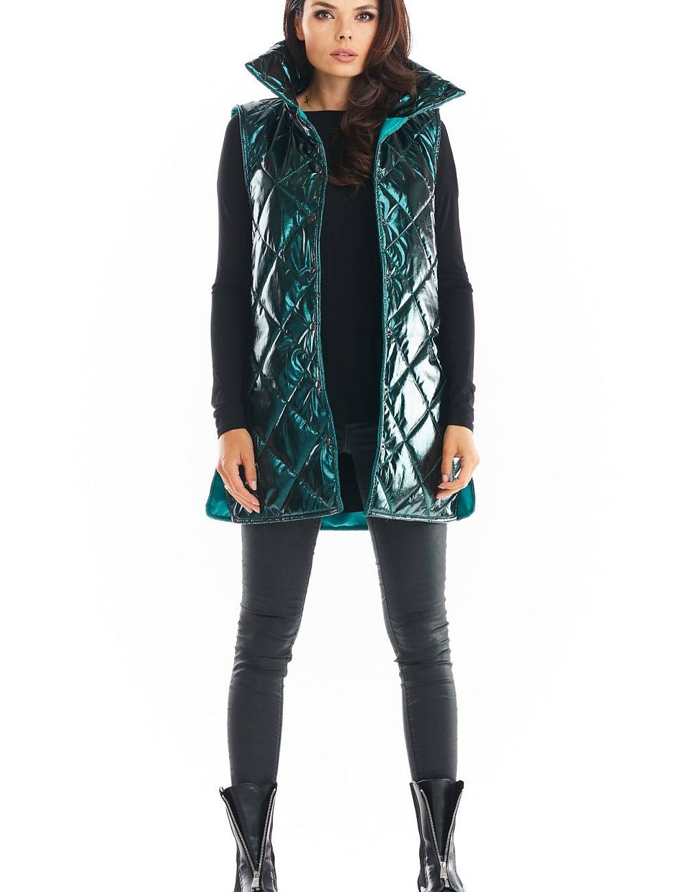 Model wearing Clarewyn Quilted High-Collar Gilet Vest in teal, with tall structured collar and button closure for a stylish autumn look.