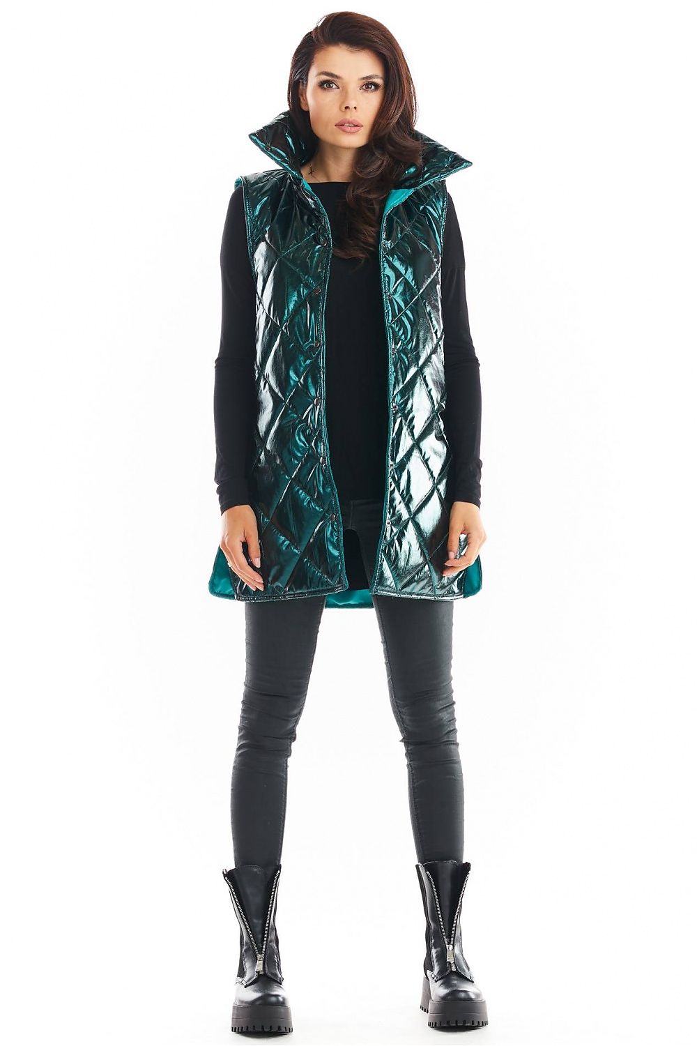 Model wearing Clarewyn Quilted High-Collar Gilet Vest in teal, with tall structured collar and button closure for a stylish autumn look.
