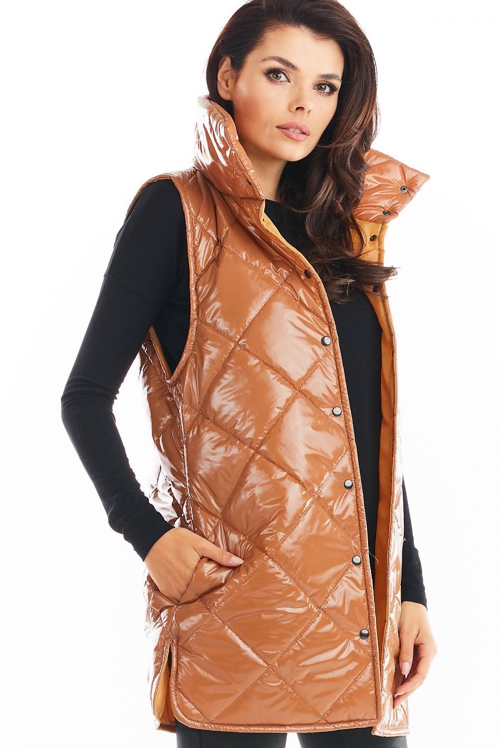 Woman wearing Clarewyn Quilted High-Collar Gilet Vest in glossy brown, featuring tall collar and button closure, for autumn layering.