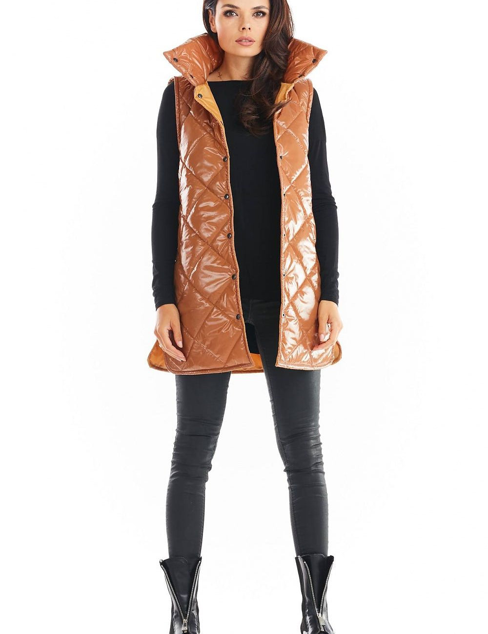 Woman wearing Clarewyn Quilted High-Collar Gilet Vest in brown with front button closure and tall collar, styled for fall fashion.