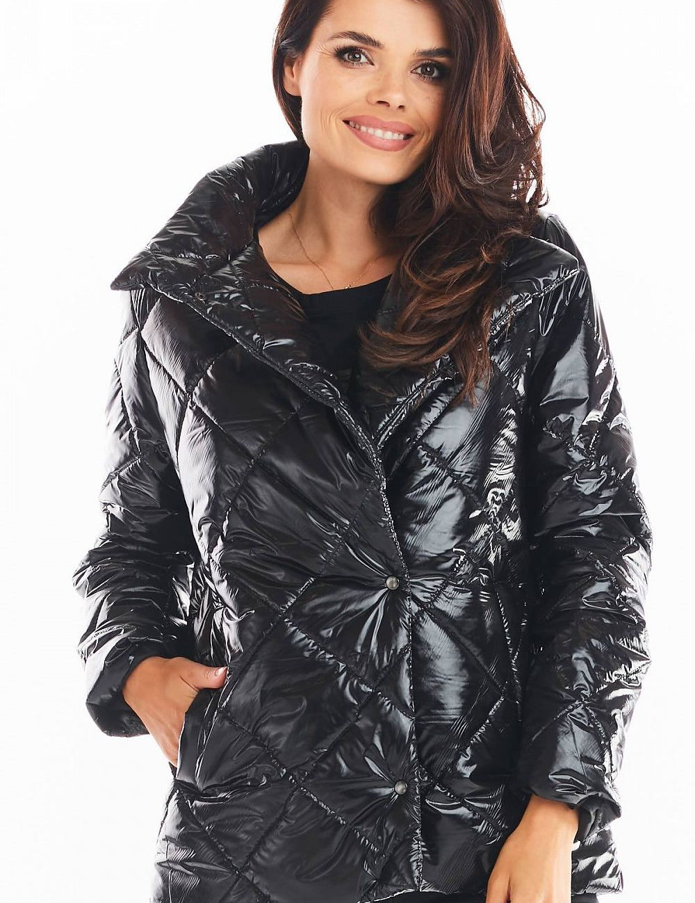 Woman wearing black Zavielle quilted jacket with stand collar, front buttons, and side pockets for warmth and style.
