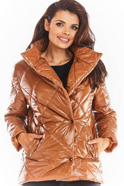 Woman wearing Zavielle Quilted Jacket with stand collar, showcasing a warm and stylish design in brown color.