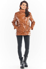 Woman wearing Zavielle Quilted Jacket with stand collar, brown color, front buttons, pockets, styled for transitional weather.