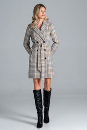 Woman modeling Loryndra belted knee-length autumn coat with plaid pattern, structured collar, six-button front, and waist-defining belt.