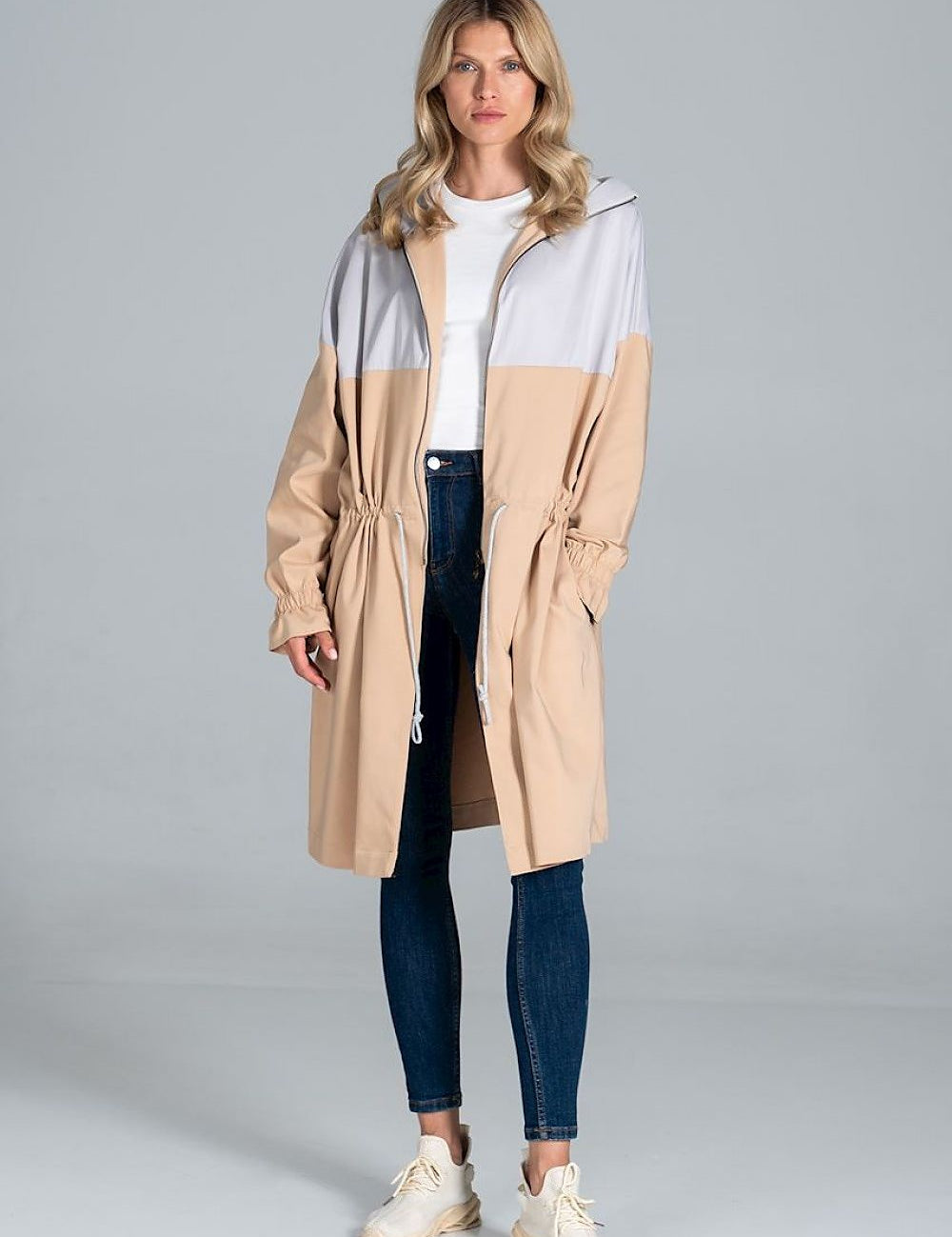 Woman wearing Ardevine Two-Tone Autumn Parka Coat with drawstring waist, partial zip, and elasticated sleeves, ideal for cool autumn days.