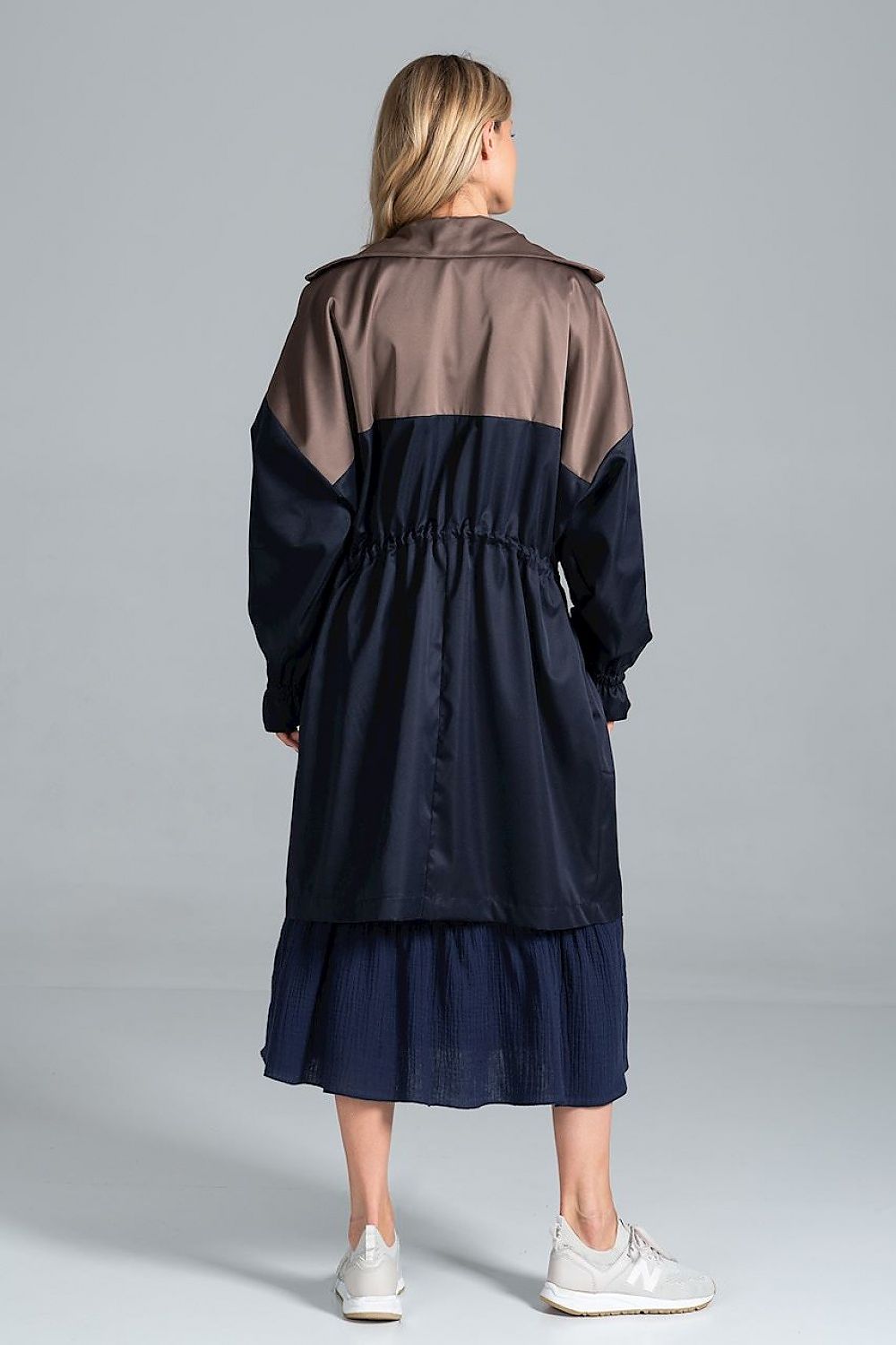 Back view of Ardevine Two-Tone Autumn Parka Coat in navy and tan, featuring a relaxed cut with a drawstring waist and elasticated sleeves.