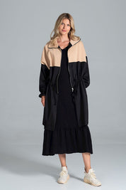 Model wearing Ardevine Two-Tone Autumn Parka Coat with drawstring waist and elasticated sleeves, perfect for crisp days.