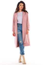 Woman wearing Sylverine Suede Belted Dressing Gown Coat in pink, paired with jeans and boots, showcasing its elegant, versatile design.