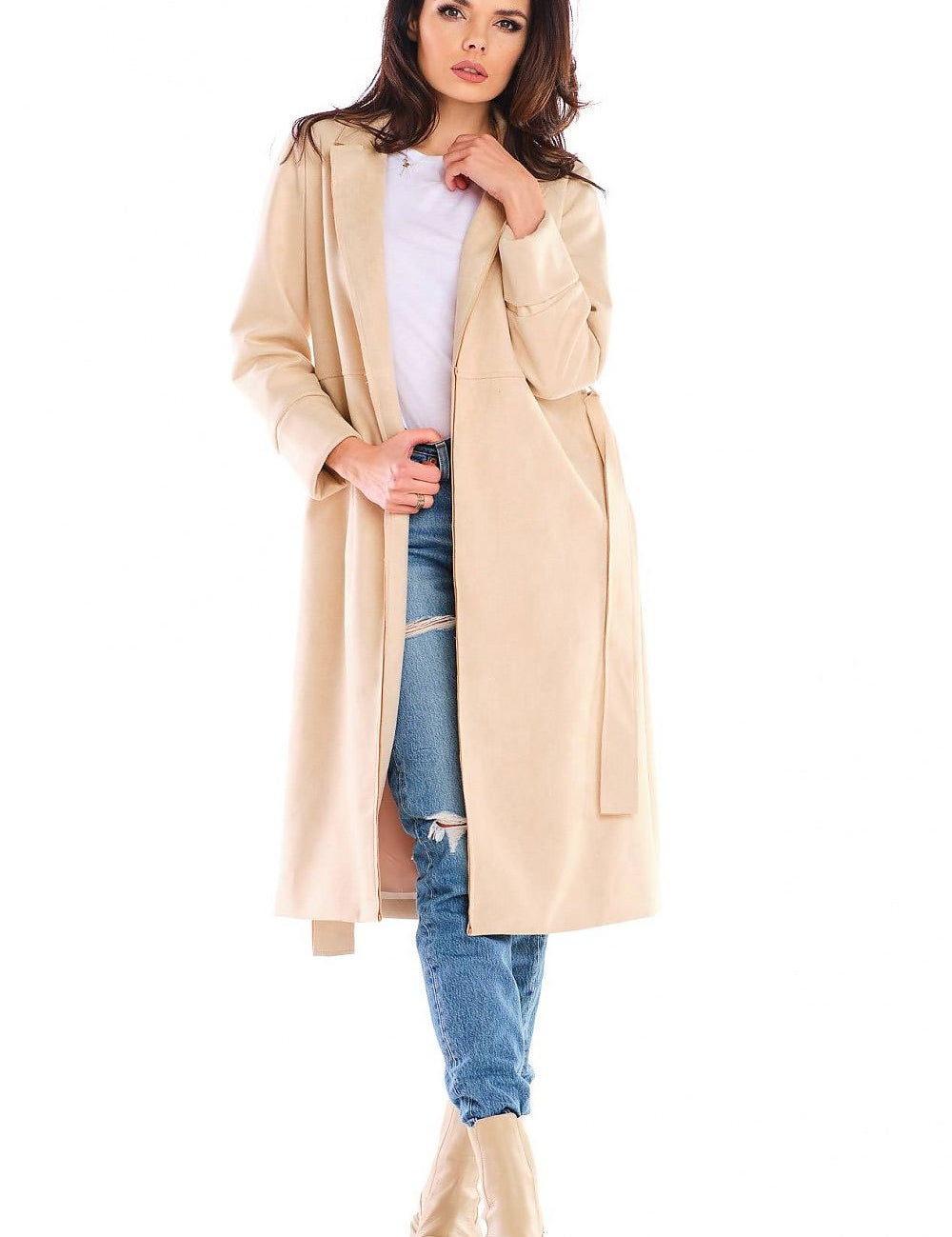 Woman wearing Sylverine suede belted dressing gown coat with jeans, showcasing elegant and versatile fashion for day or evening.