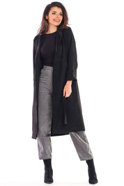 Model wearing Sylverine Suede Belted Dressing Gown Coat in black, showcasing elegant drape and versatile style for day or evening.
