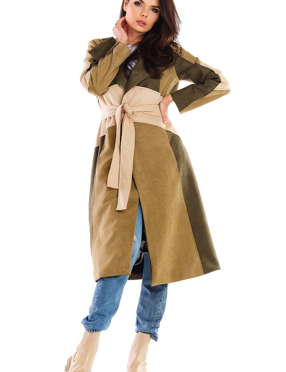 Woman wearing Auralenne long suede belted coat in autumn tones with jeans and boots. Flattering fit ideal for refined or casual events.