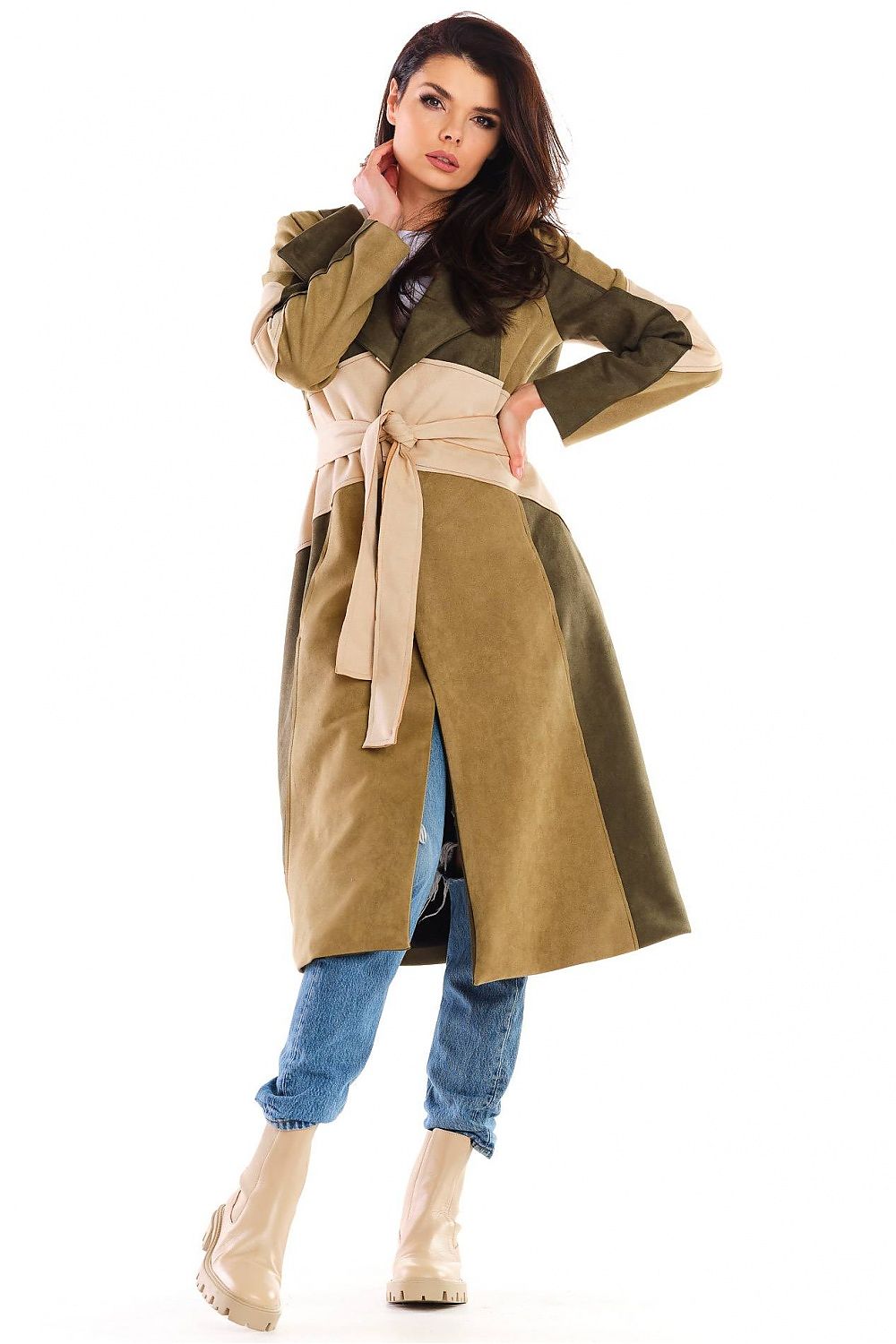 Woman wearing Auralenne long suede belted coat in autumn tones with jeans and boots. Flattering fit ideal for refined or casual events.
