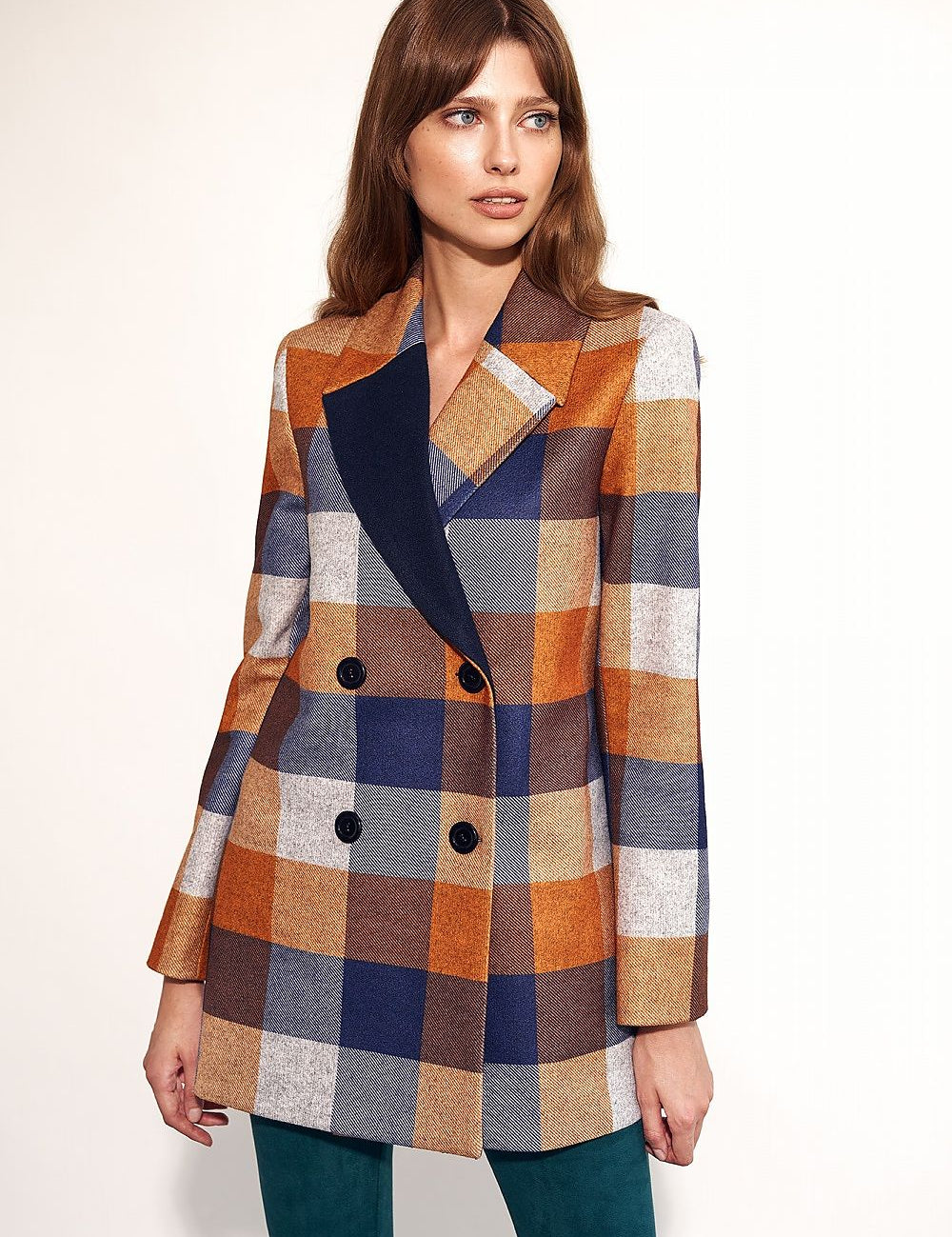 Woman wearing Maelvara checked double-breasted coat with notched collar, perfect for autumn style and elegance.