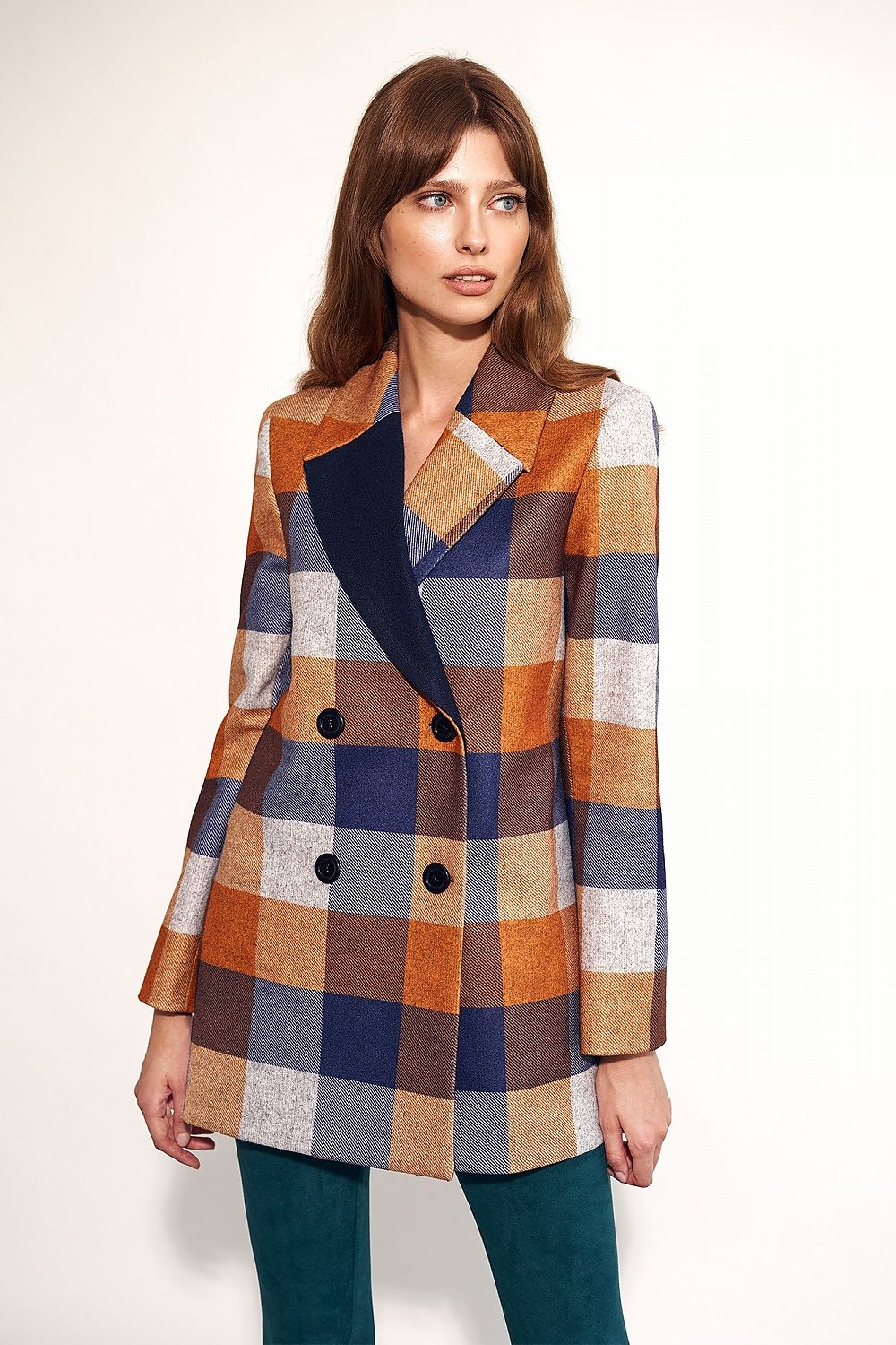 Woman wearing Maelvara checked double-breasted coat with notched collar, perfect for autumn style and elegance.