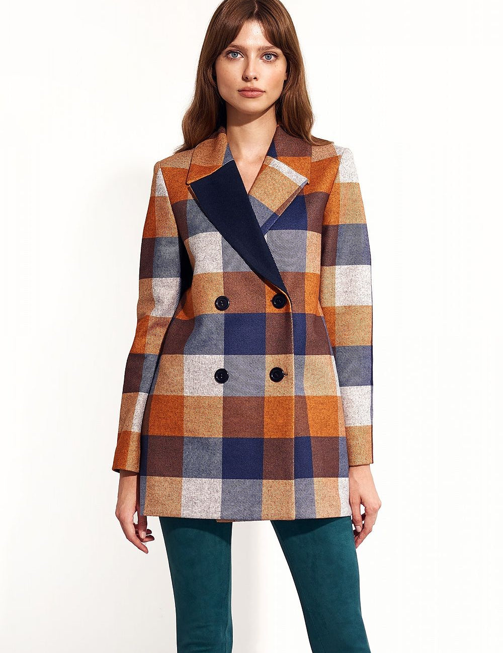 Woman wearing Maelvara checked double-breasted coat with notched collar and side pockets, showcasing elegant autumn style.