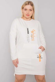 Model wearing Plus Size Erelvine Pocket Day Dress with long sleeves and front pocket in white, showcasing casual and elegant style.