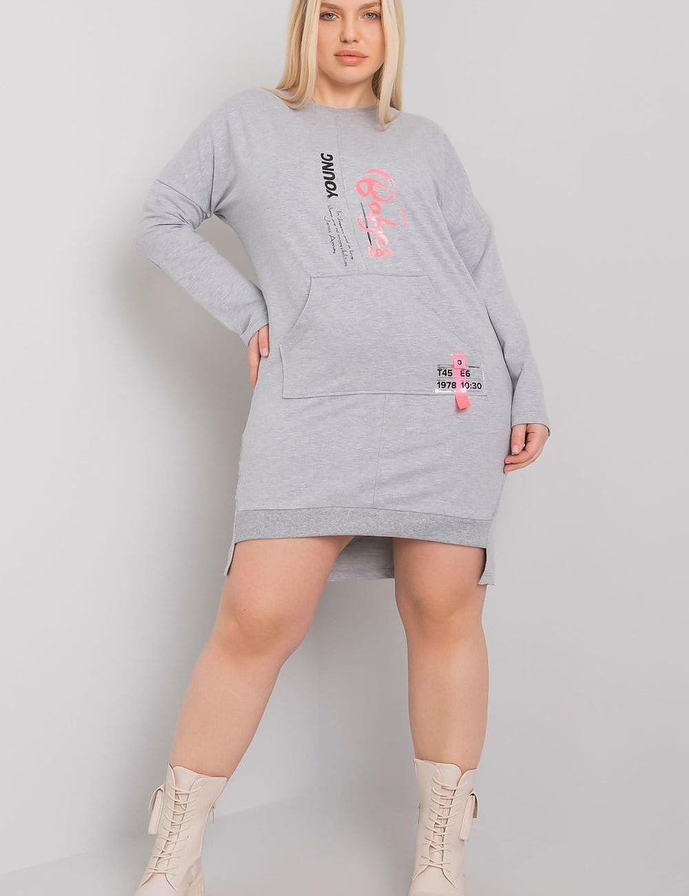 Plus Size Erelvine Pocket Day Dress in gray, featuring long sleeves and front pocket, worn by model. Casual elegance for everyday.