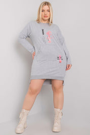 Plus Size Erelvine Pocket Day Dress in gray, featuring long sleeves and front pocket, worn by model. Casual elegance for everyday.