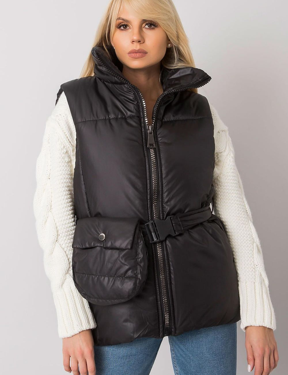 Woman wearing Calveris Belted Lined Zip Gilet with front zip, side pockets, and belt; ideal for layering in transitional seasons.
