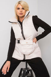 Model wearing Calveris Belted Lined Zip Gilet, showcasing its belted waist and practical side pockets for versatile styling.