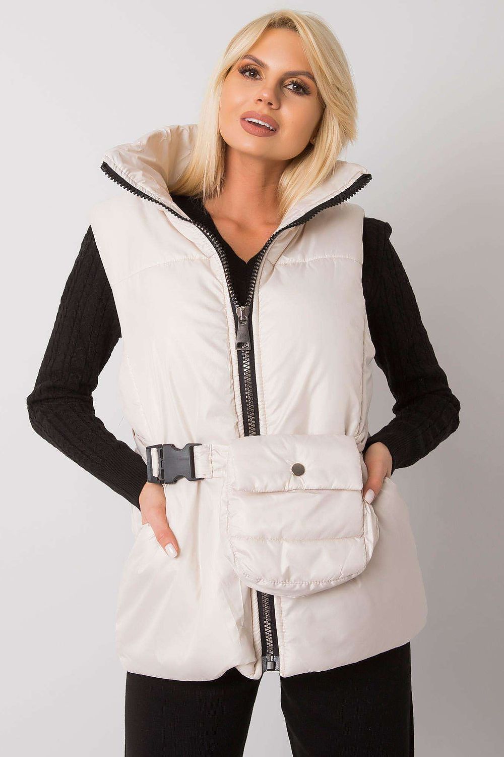 Woman wearing Calveris Belted Lined Zip Gilet, sleeveless down-style vest with front zip, belt, and side pockets for versatile layering.
