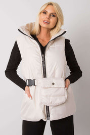 Woman wearing Calveris Belted Lined Zip Gilet, sleeveless down-style vest with front zip, belt, and side pockets for versatile layering.